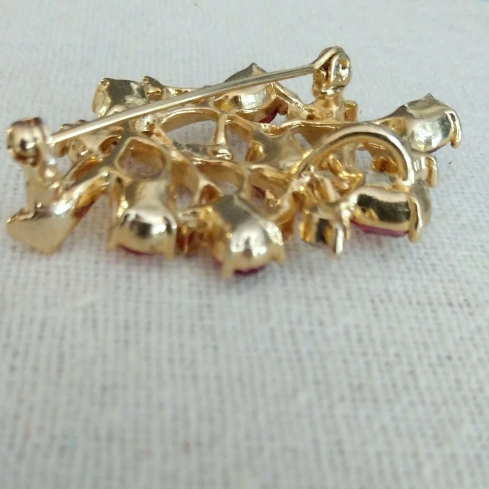 Purple and gold flower brooch